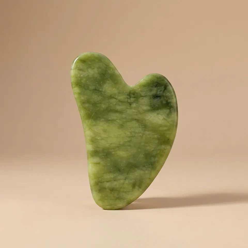 Jade facial massage roller, studio shot