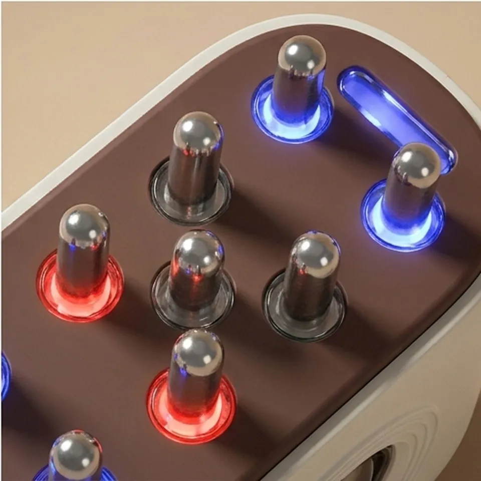 Close detail of the polished steel massage nodes and LED ring