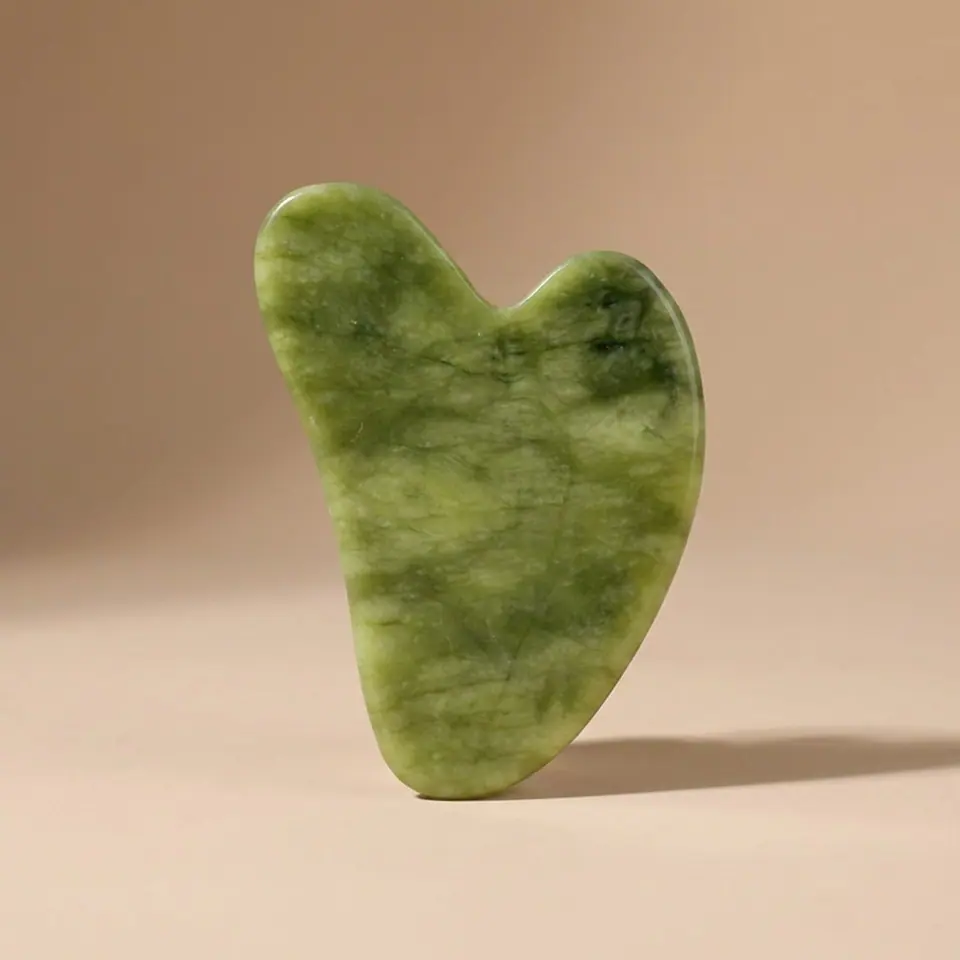 Jade roller, angled detail of the large stone head